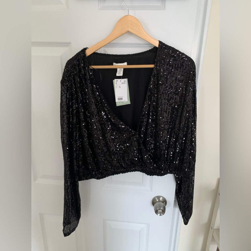 NWT black sequin long sleeve v-neck top
